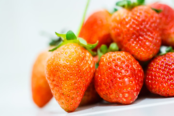 Strawberry berries on a white background.
