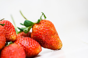 Strawberry berries on a white background.