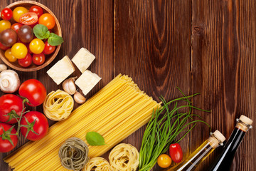 Italian food cooking ingredients. Pasta, tomatoes, basil