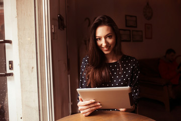 Beautiful girl working with high technology