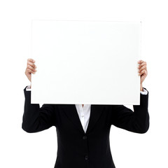 Business woman cover face with billboard