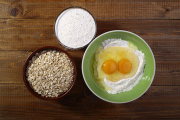 Set of ingredients for baking with yolk in flour