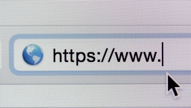 Macro movie of computer screen and http:// address bar with www