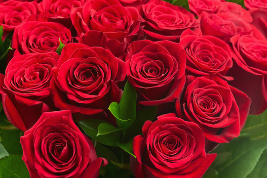 Colorful flower bouquet from red roses for use as background.