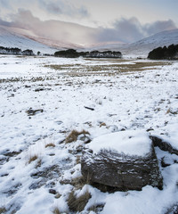 Winter sunrise over mountain range landscape