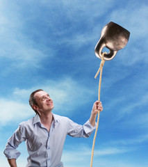 Strange dreamy man with a kettlebell