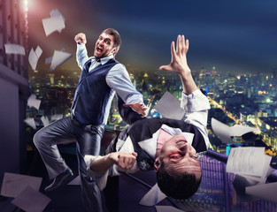 Businessmen fighting