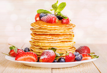 Homemade pancakes with berries and fruit