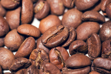 Brown coffee beans, close-up of coffee beans for background 