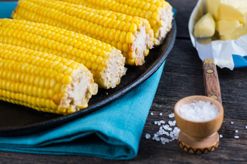 Homemade golden corn cob with butter and salt