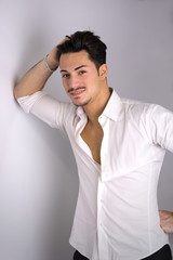 Elegant attractive young man with white shirt