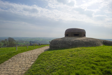Belgian bunker from WW II under a blue cloudy sky