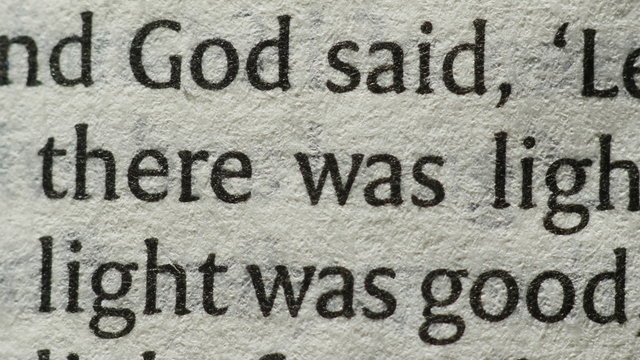 Fast browsing the pages of a Holy Bible. Genesis. Timelapse.