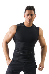 Obraz na płótnie Canvas Handsome athletic young man in black t-shirt isolated