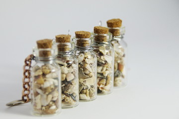 small seashells from Meditteranian Sea in a small glass bottle