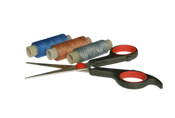Scissors and spool of thread