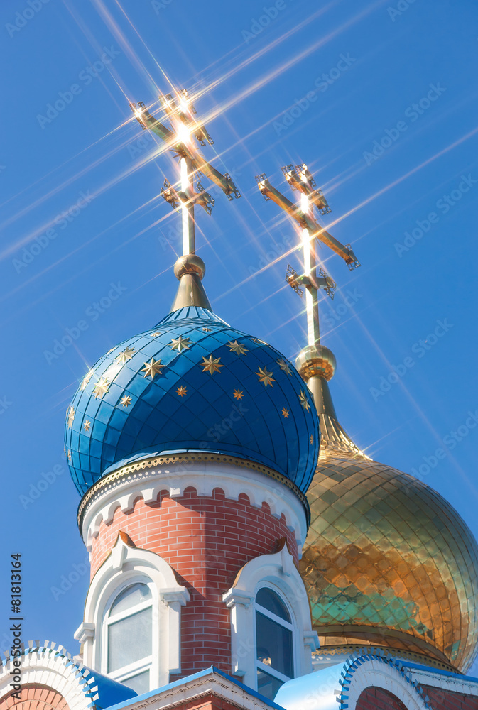 Sticker Domes of Russian orthodox church with cross against blue sky