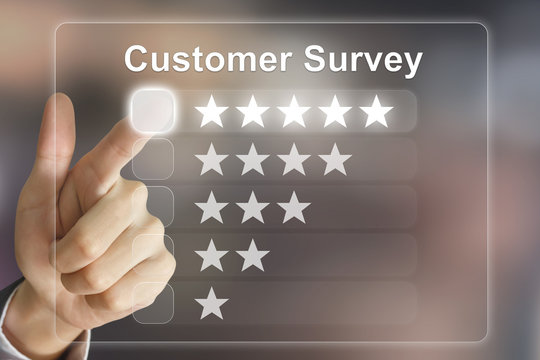 business hand pushing customer survey on virtual screen