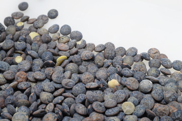 Black and green lentils background