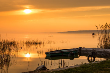 The boat docked on the lake Balaton - obrazy, fototapety, plakaty