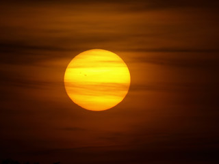 big sun on red sky