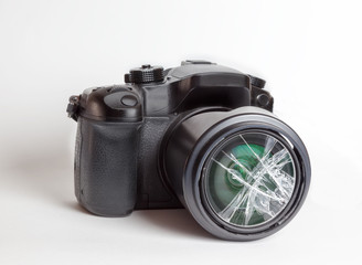 Digital reflex camera with the front lens broken.