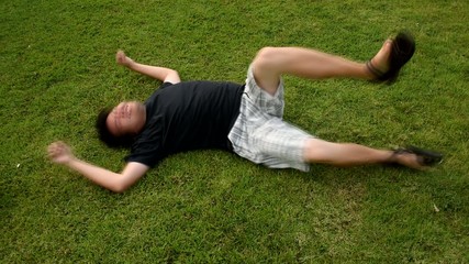 An Asian Thai man is wriggling like a child with happy face