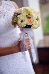 Bride holding a beautiful wedding bouquet