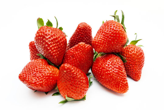 Several strawberries isolated on white background