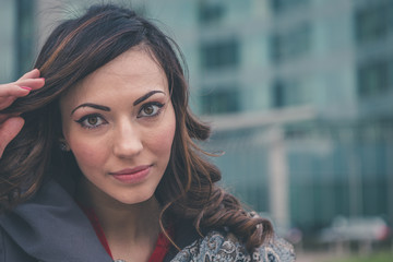 Beautiful girl posing in an urban context
