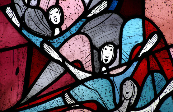 Singing angels in stained glass