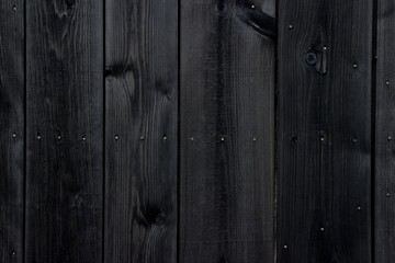 Obraz premium Old black painted wood wall - texture or background