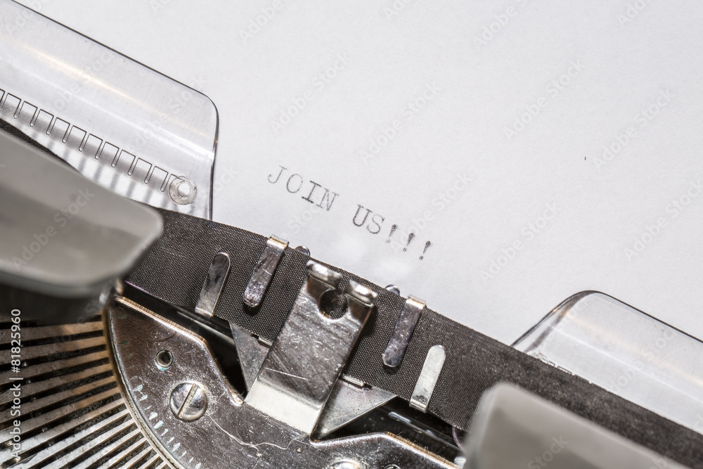 Fototapete old typewriter with text join us