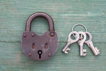 Old rusty padlock and key