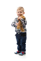 three year old boy with a toy bear on white background