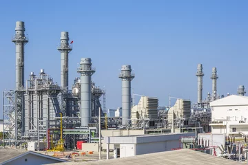 Photo sur Plexiglas construction de la ville Gas turbine power plant with blue sky 
