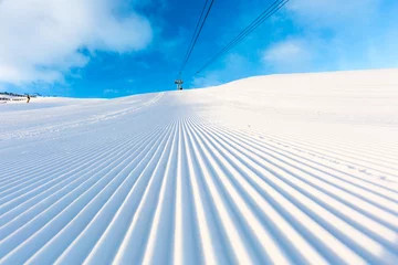 Fotobehang Groomed ski piste © Mikkel Bigandt