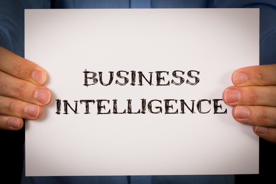 Man with Business Intelligence sign