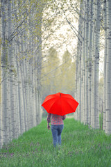 Woman with Red Umbrella Walking Away