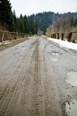 country mud road in mountains