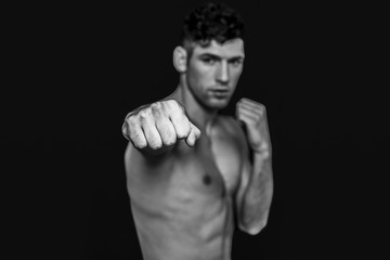 Fototapeta premium Man punching