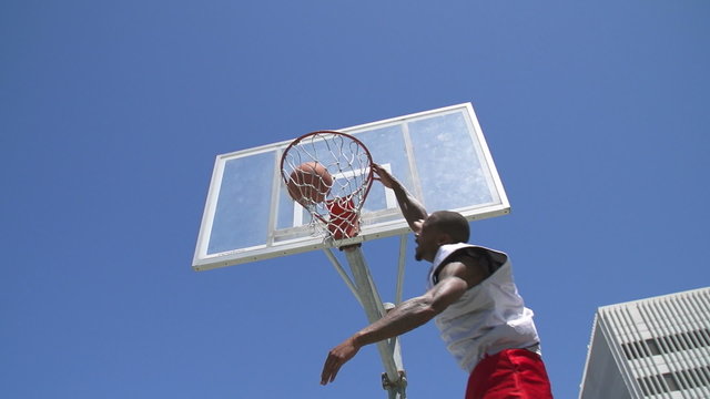 Slow Motion Basketball Player Dunking