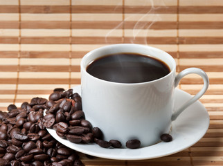 Coffee cup and saucer on a wooden