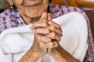 Hands of the old woman.
