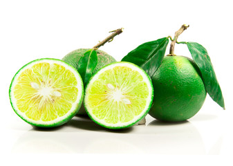 Fresh limes isolated on white