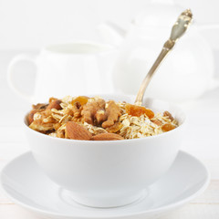Oatmeal flakes with nuts in bowl