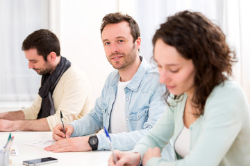Young attractive student during classes