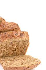 Slices of brown bread on table