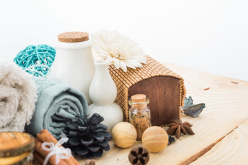 spa stuff, cinnamonand flower with towel on wood