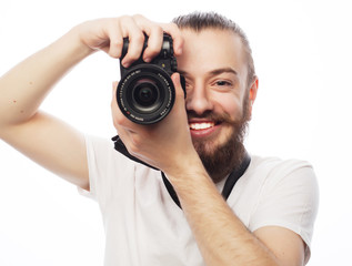 Fototapeta premium Young bearded photographer